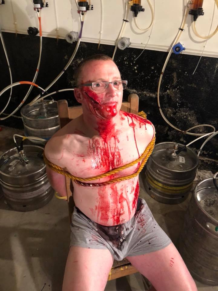 The High Priest naked and covered in blood. Photo shot from the video "They tried to put a spell on me"